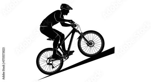 Streamlined action silhouette of a mountain biker descending a trail with speed and athletic precision
