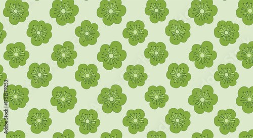 A visually appealing pattern of sliced kiwi fruit arranged in a repeating geometric design.
