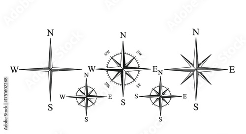 Collection of vintage hand drawn compasses and directional roses