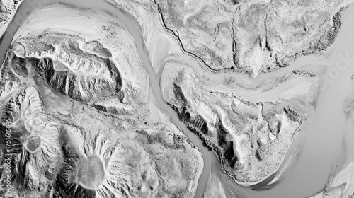 Aerial imagery of a winding river delta, highlighting sediment patterns and the merging of land and water