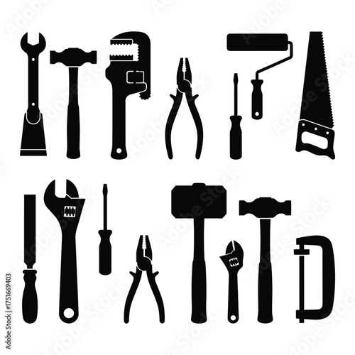 Black silhouette of various hand tools arranged on a white background for construction work