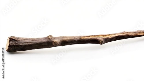 A wooden piece sits on a clean white surface