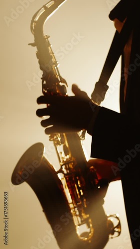 Wallpaper Mural vertical slow motion silhouette of saxophonist performing on stage in warm light and smoke symbol of art of sound creative soul retro jazz night vintage mood and artistic inspiration Torontodigital.ca