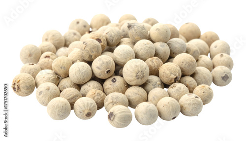 Heap of dried, beige, globular peppercorns against a black backdrop