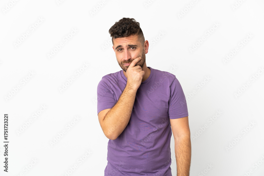 Fototapeta premium Caucasian man isolated on white background having doubts