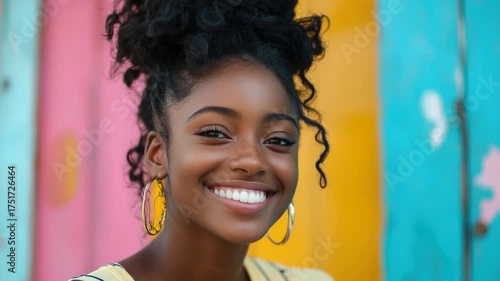 A young woman with a big smile on her face, great for use in lifestyle and people stock images