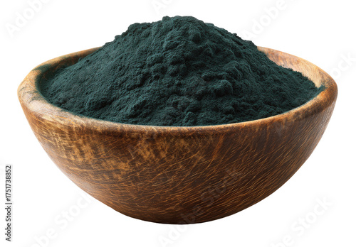 Dark-green powder in a wooden bowl