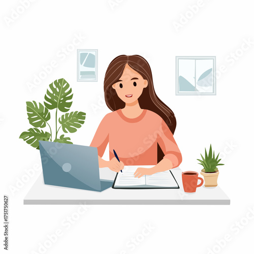 Focused young woman working remotely from her home office, diligently writing in a notebook while using a laptop, creating a productive and comfortable workspace