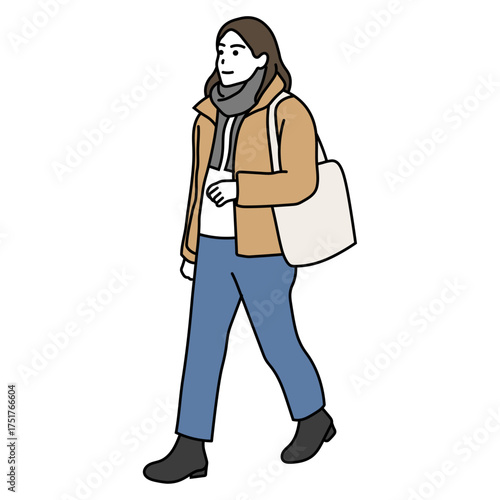 冬の通勤　カジュアルコートを着て歩く女性