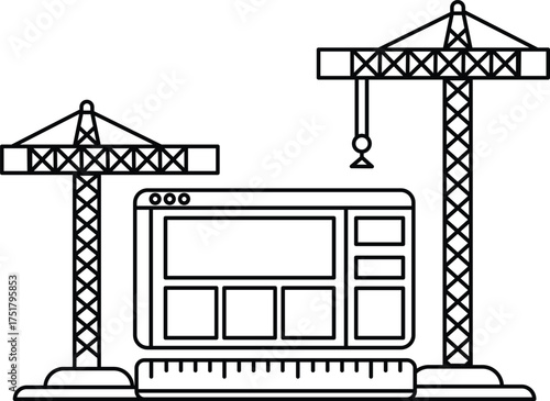 A construction site with cranes and a computer monitor