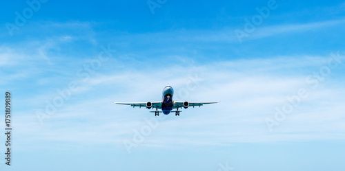 The plane is landing at the airport