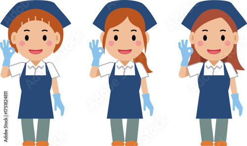 OKサインを出し、笑顔の紺色エプロンの女性清掃員。その2