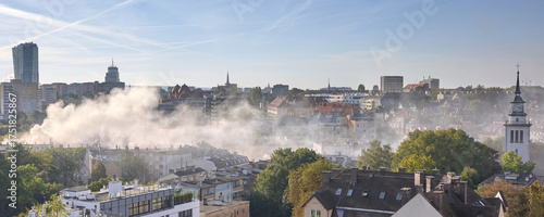 Smoke from the chimneys of coal heated houses.