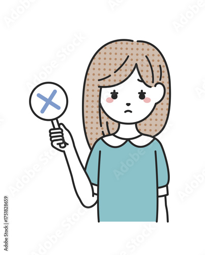 バツの札を持つ女性