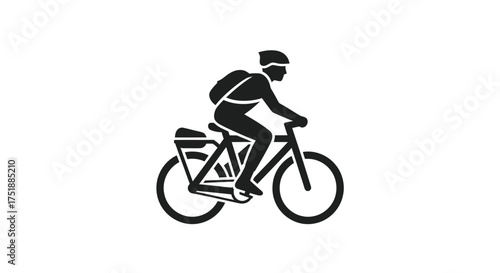 Silhouette of a Cyclist Riding a Bicycle with Backpack and Panniers.