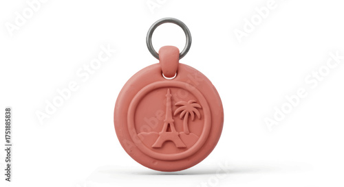 Round Coral Keychain with Eiffel Tower and Palm Tree Embossing.