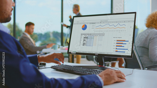 Картината върху платно Business professional analyzes financial reports and builds charts in a spreadsh