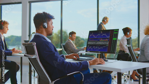 Photos Diverse team of financial brokers wearing headsets, analyzing stock market chart