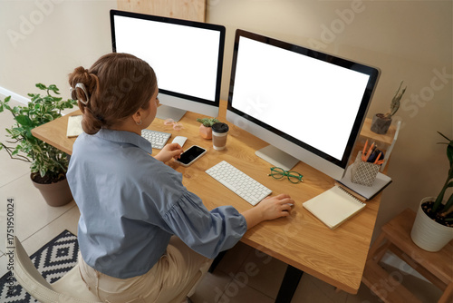 Young woman working with co...