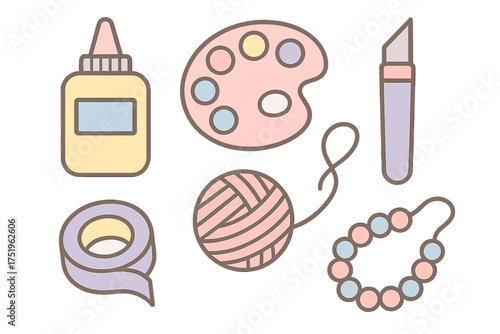 Cute pastel crafting and art supplies set with glue, yarn, palette, and cutter