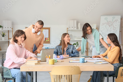 Group of students studying ...