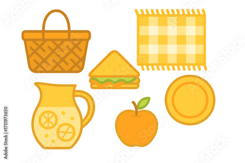 Classic outdoor picnic assortment featuring food, beverages, blanket, and basket