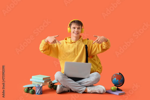 Male student in headphones ...