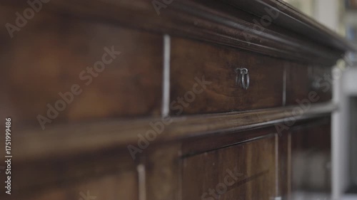 Closing  a old  brown wooden drawer