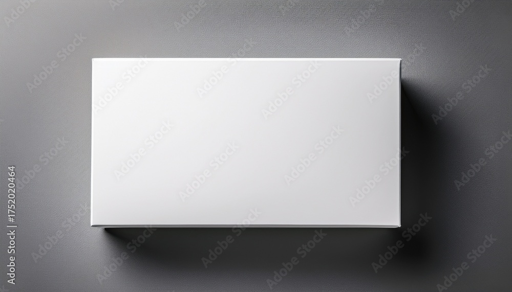 Fototapeta premium a top down view of a white rectangular box blank and ready for branding placed at a slight angle to highlight its clean minimal design