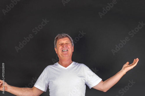Wallpaper Mural smiling happy casual dressed man in studio Torontodigital.ca