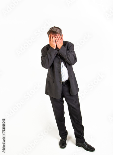 Wallpaper Mural businessman on white background having problems and covering face Torontodigital.ca