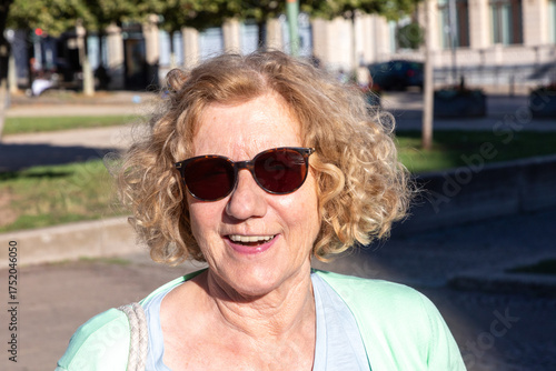 Wallpaper Mural portrait of very attractive mature woman outdoors with natural light Torontodigital.ca