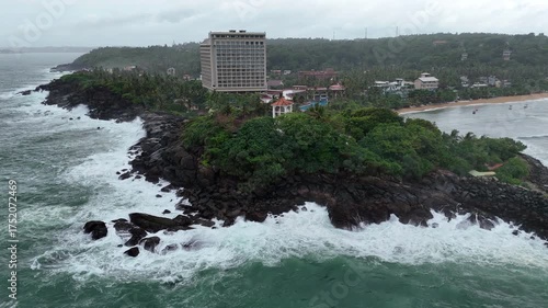 Waves crashing on rocky tropical coast in southern Sri Lanka