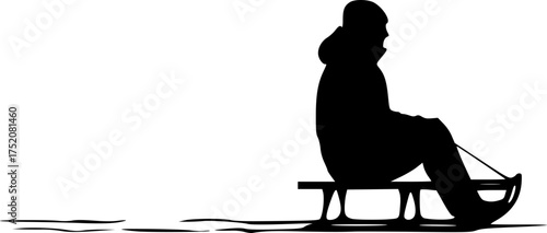 a black silhouette of a person riding a sled