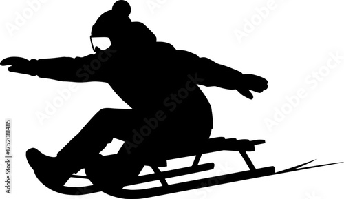 a black silhouette of a person riding a sled