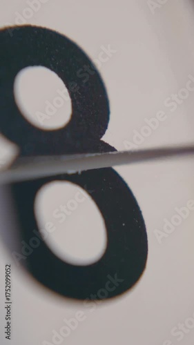 Close-up shot of date number field on a flip calendar rapidly changing