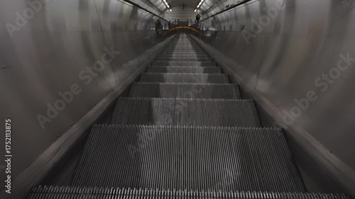 Electric escalator in metro. Moving staircase.
