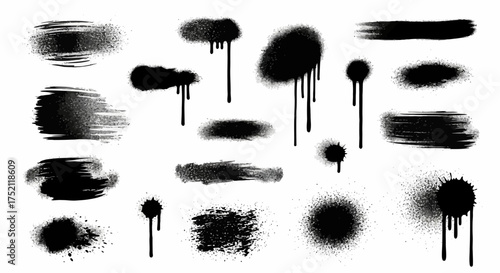 A versatile set of black graffiti spray paint elements, including aerosol drips, splatters, and textured strokes isolated on a white background