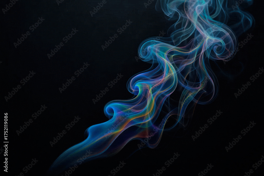 Fototapeta premium Colored smoke on a black background in artistic lighting. Space for text.