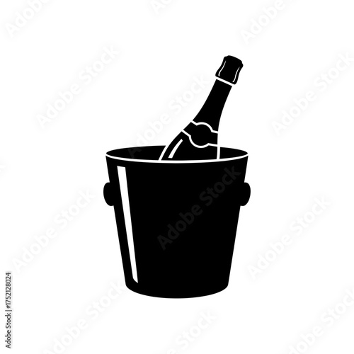 Champagne bottle chilling in ice bucket for celebration and party.