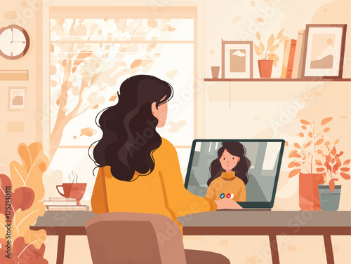 Woman having a video call with friend at her desk surrounded by autumnal decor and warm tones