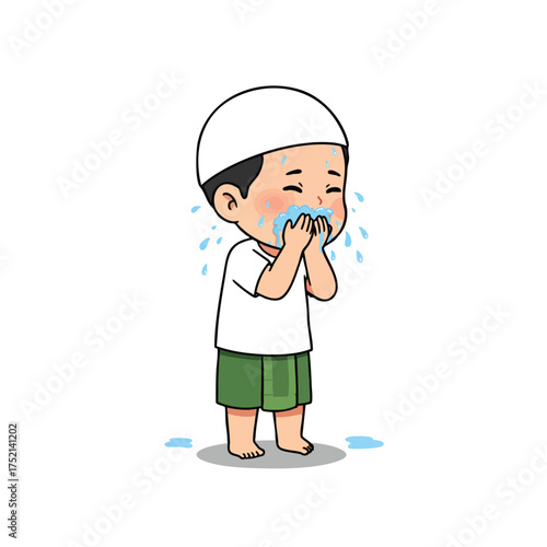 a little Muslim boy performing wudhu at a small water tap