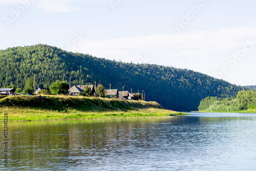 photo of the Ural River. hills and trees around