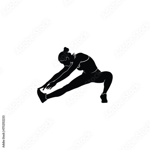 Woman stretching in a dynamic yoga pose silhouette