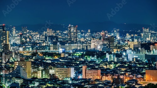 Wallpaper Mural Aerial cityscape at night showing illuminated buildings, city lights and skyline in urban scenery. Torontodigital.ca