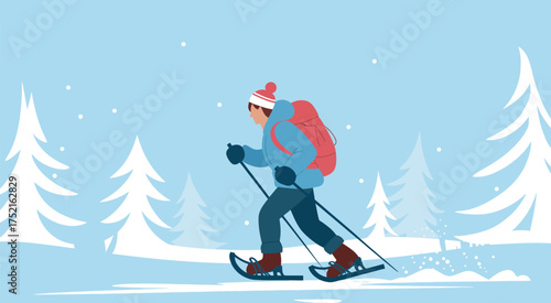 Winter landscape with man snowshoeing among snow covered trees during gentle snowfall in nature