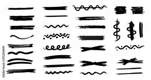 Collection of hand drawn black brush stroke elements and scribble lines isolated on white background