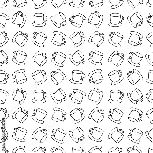 Seamless pattern of black and white coffee cups randomly scattered on transparent background
