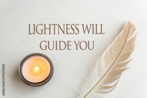 A candle and feather creating a calming aesthetic scene