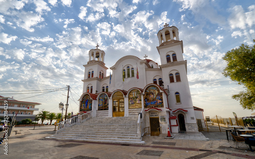 Paralia, Katerini, Greece 14.08.2025: Famous greek orthodox Church Agia Paraskevi on the shore of Aegean Sea.
